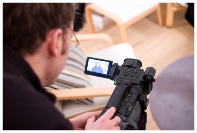 Producer/Director setting up the camera