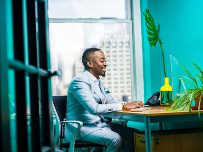 leverage your skills for success man in suit at computer