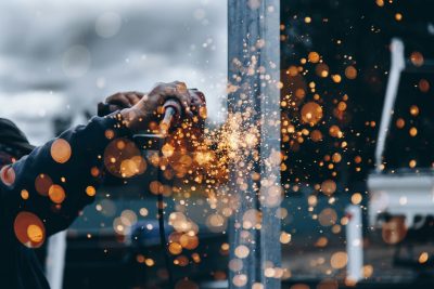 a drill cutting into metal