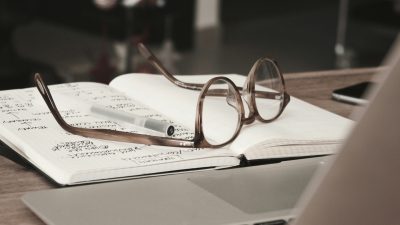 glasses on a notebook